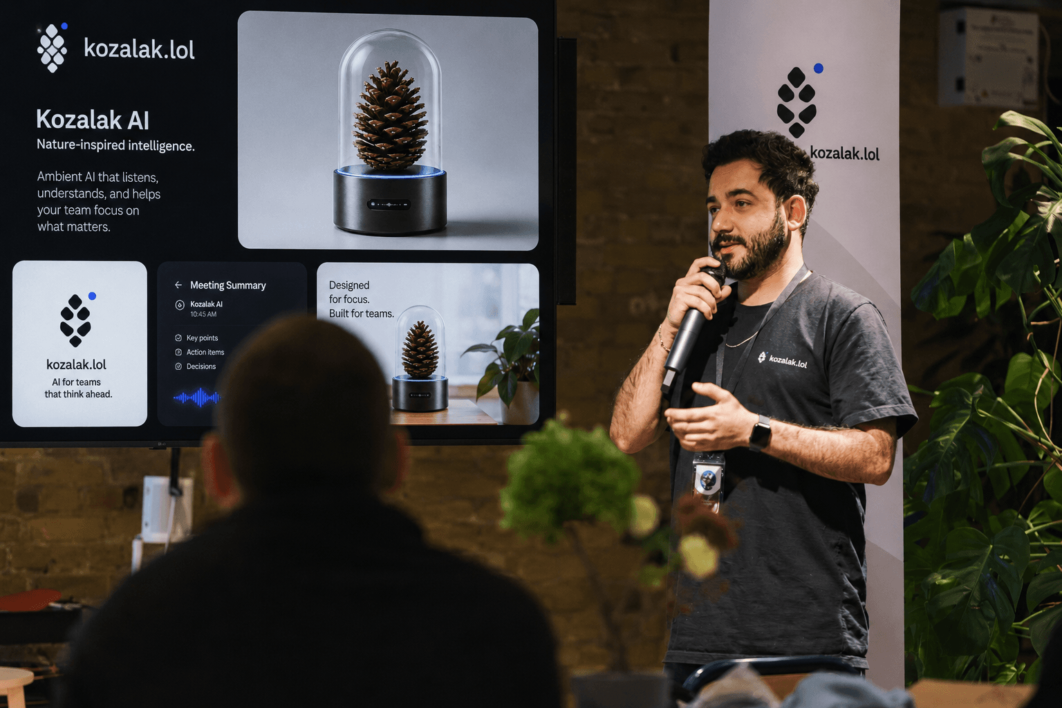 Kozalak AI team member speaking at a product presentation